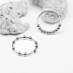 Sormus stressinlievitykseen ja pyörivillä helmillä miehille tai naisille hopea