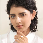 Kehäsormus, jossa on päivänkakkarakukka