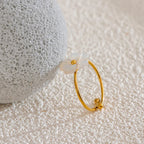 Kehäsormus, jossa on päivänkakkarakukka