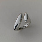 Hopeoitu vesipisaran sormus