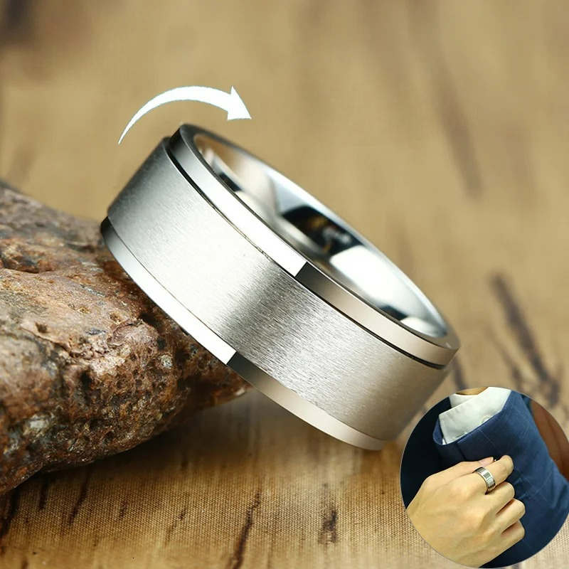 Miesten hopeinen pyörivä stressinlievityssormus