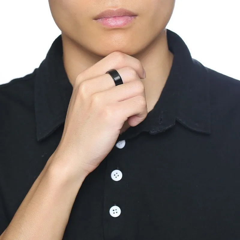 Miesten musta pyörivä stressinlievityssormus