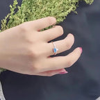 Sormus, jossa on jäävuorikolmio