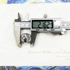 Sormus Fleur de Lys hopeaa