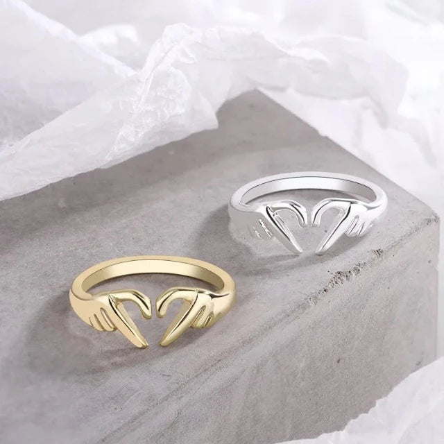 Romanttinen sydänsormus hopeaa ja kultaa