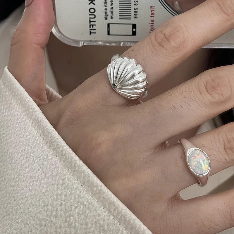 Sormus simpukankuoresta, kampasimpukka