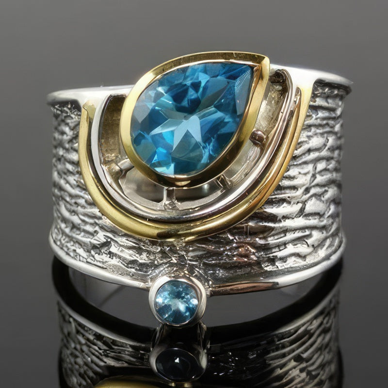 Etninen hopeasormus ja kivi 