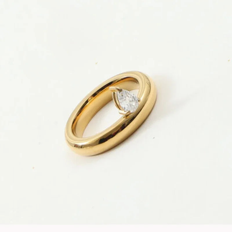 Ohut vesipisaran sormus zirkonhelmellä 1