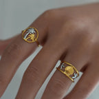 Pyöreä sormus, jossa palmuja