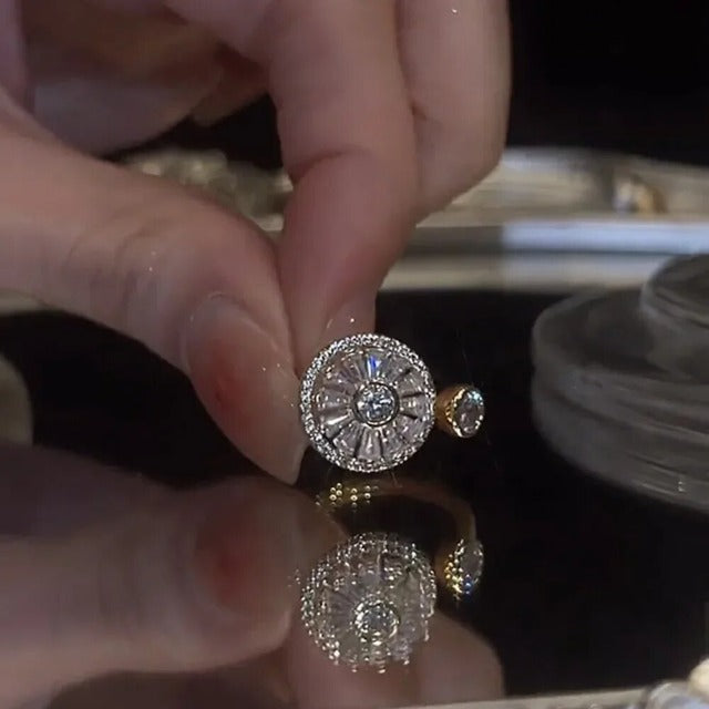 Naisten kultainen pyörivä stressinpoistorengas