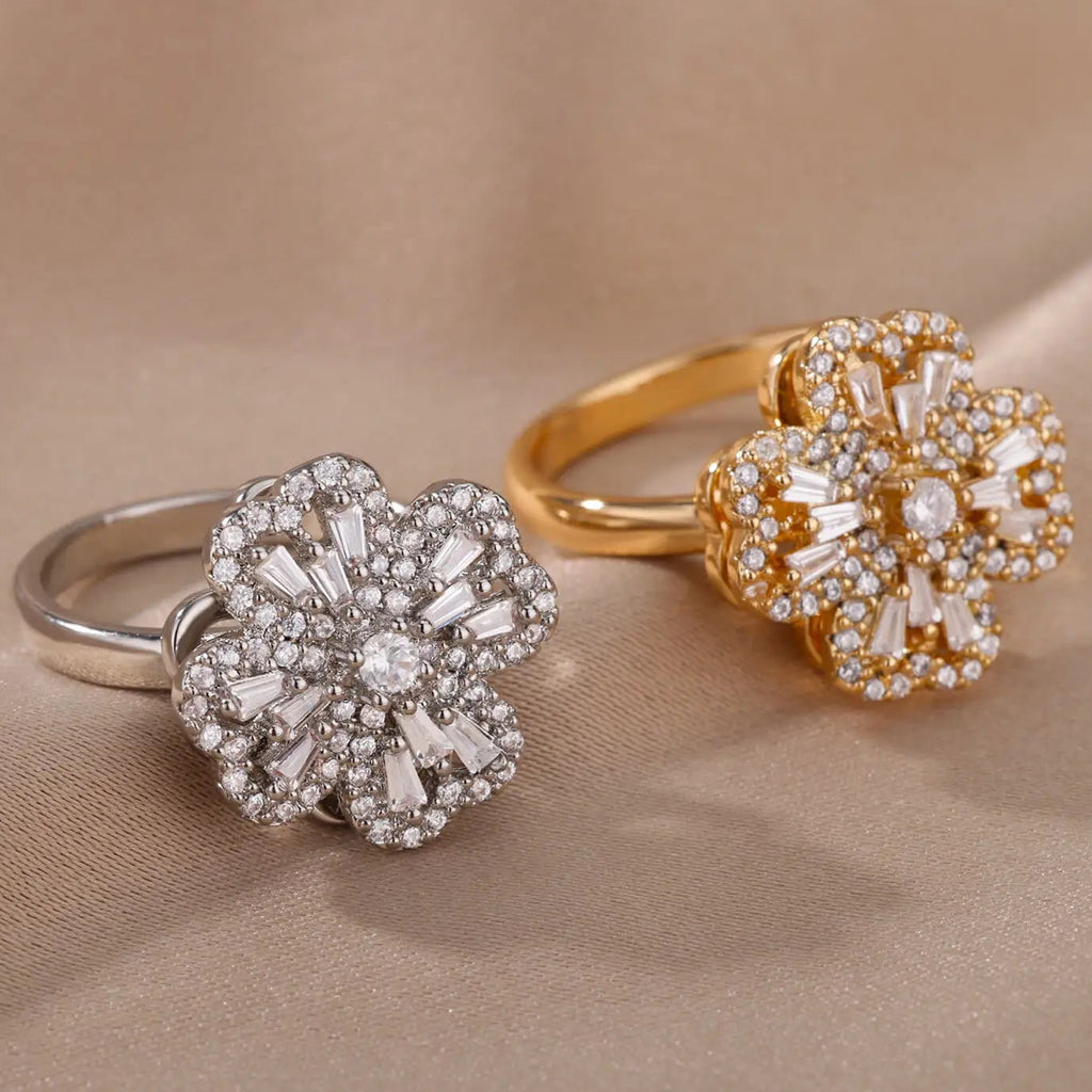 Pyörivä neliapilarinen apilakuvioinen sormus kullattu hopea
