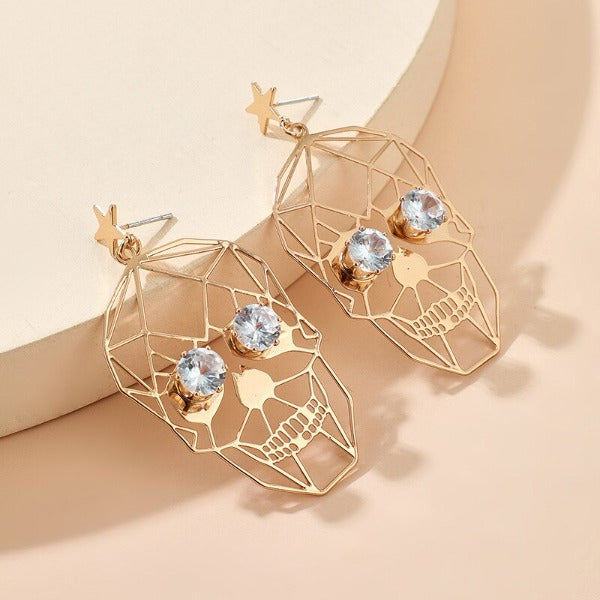 Naisten pääkallokorvakoru