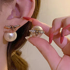 Mehiläiskorvakorut ja valkoinen helmi