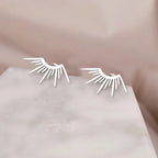 Puolikuun auringon nappikorvakorut hopeoitu