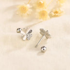 Neliapilan muotoiset nappikorvakorut, joissa on zirkonia