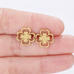 Nappikorvakorut nelilehtisen apilan lehdellä kulta