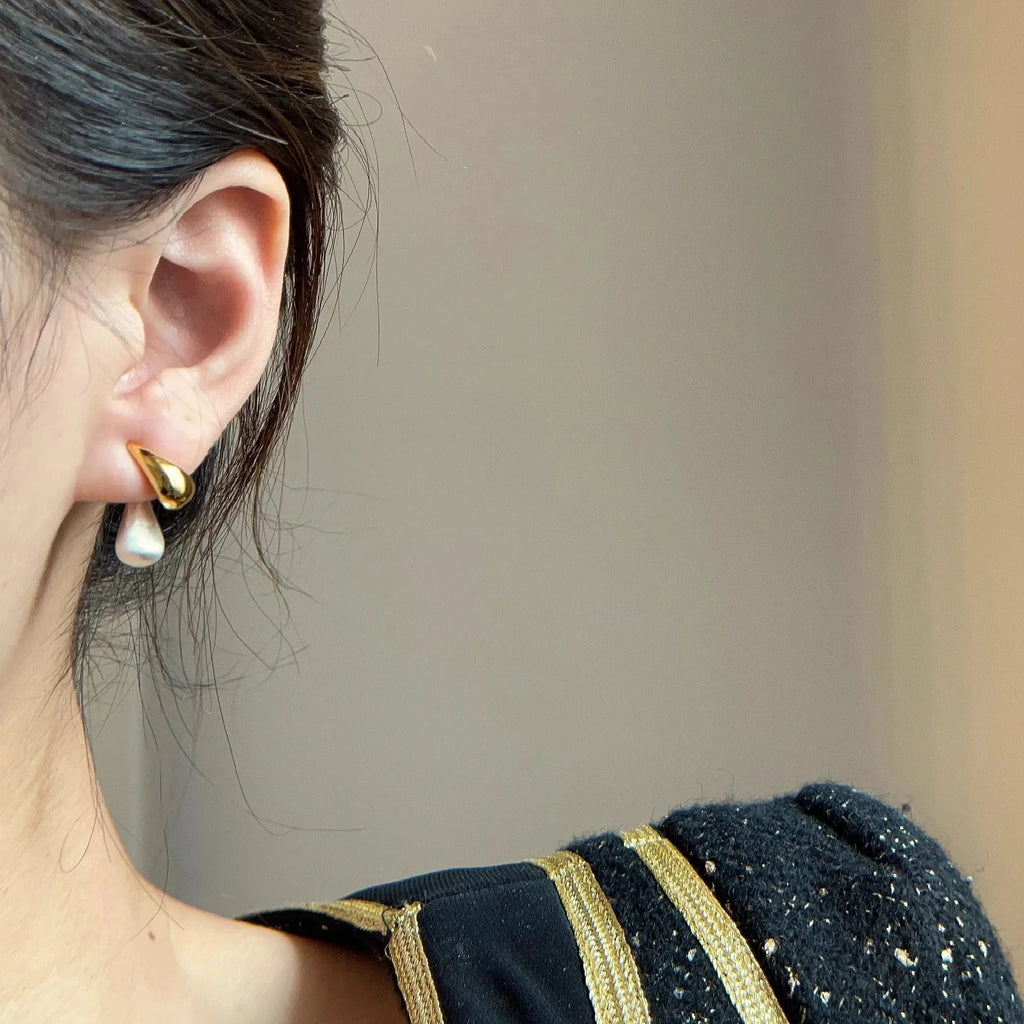 Pisaranmuotoiset nappikorvakorut