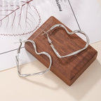 Suuret sydänkorvakorut tappi