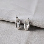 Buddhan käden hopeiset nappikorvakorut