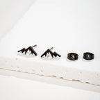 Vuorikoru nappikorvakorut naisille tai miehille musta