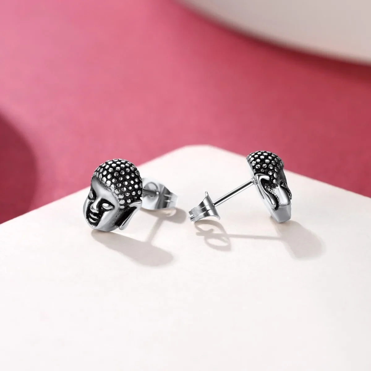 Hopeiset Buddha-pään nappikorvakorut