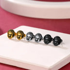 Mustat Buddha-pään nappikorvakorut