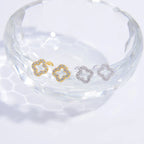 Nappikorvakorut nelilehtisellä apilalla kulta