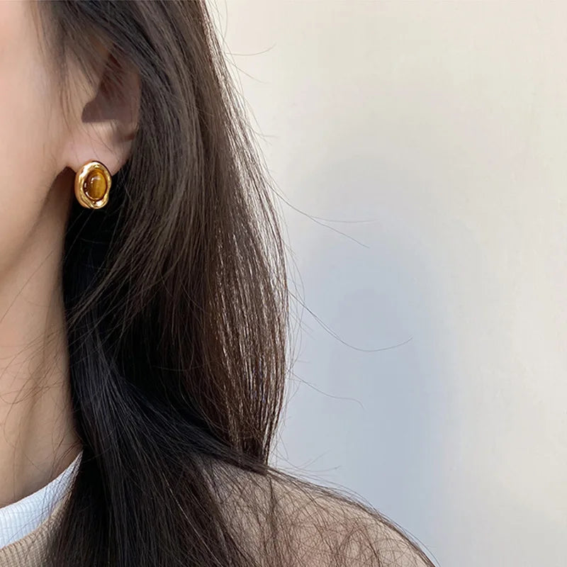 Tiikerinsilmä ovaalit nappikorvakorut