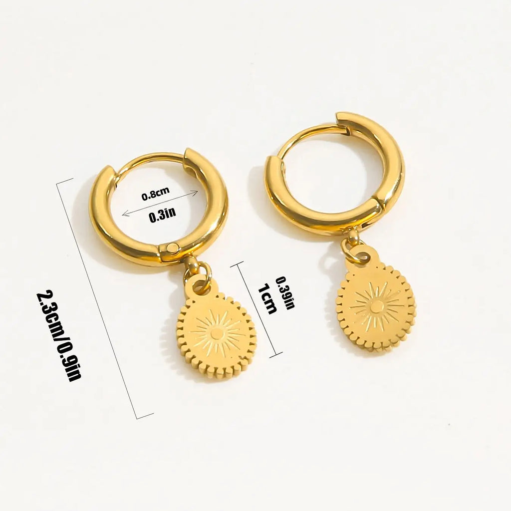 Riipuvat kompassikorvakorut, tuuliruusu