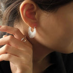 Boucles d'oreilles créoles demi-soleil argentées