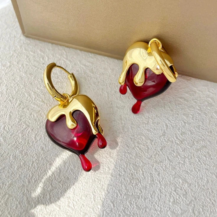 Sulavat sydänkorvakorut kultaa