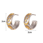 Retro-aurinkokorvakorut hopeaa