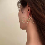 Vintage-asymmetriset kukkaniittikorvakorut kulta