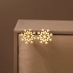 Naisten lumihiutale nappikorvakorut kulta