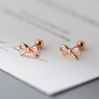 Minimalistiset korvakorut perhossolmio ruusukulta