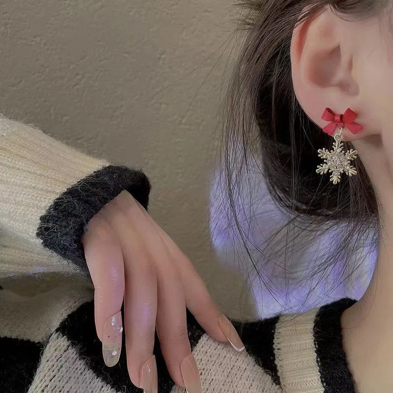 Naisten talven punaiset lumihiutale-rusetti korvakorut