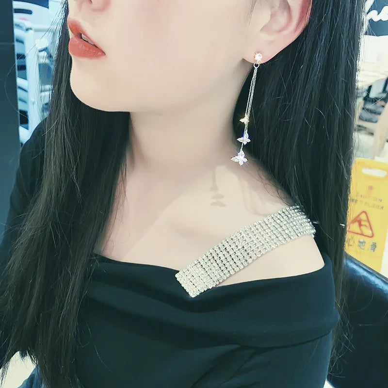 Perhosen muotoiset naisten korvakorut