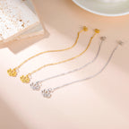 Riipuvat korvakorut hienolla lootuskukalla 