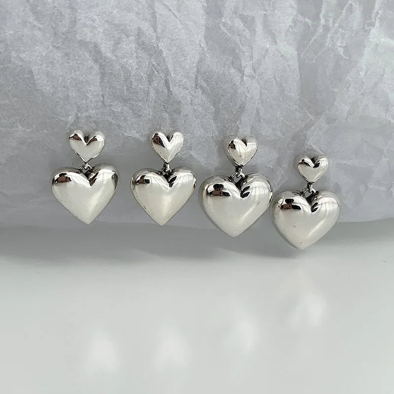 Naisten sydänkorvakorut, roikkuvat nappikorvakorut