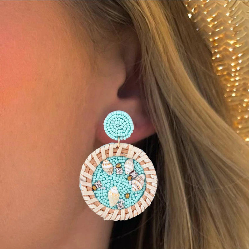 Riipuvat korvakorut simpukka kauri