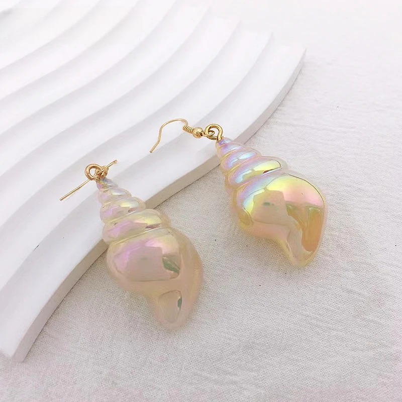 Helminauhakorvakorut, simpukankuori, etana