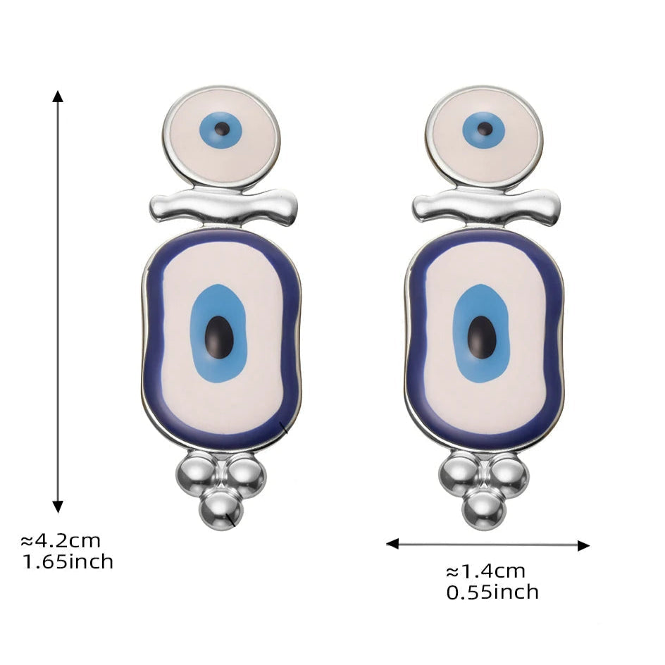 Riipuvat korvakorut etninen sininen silmä