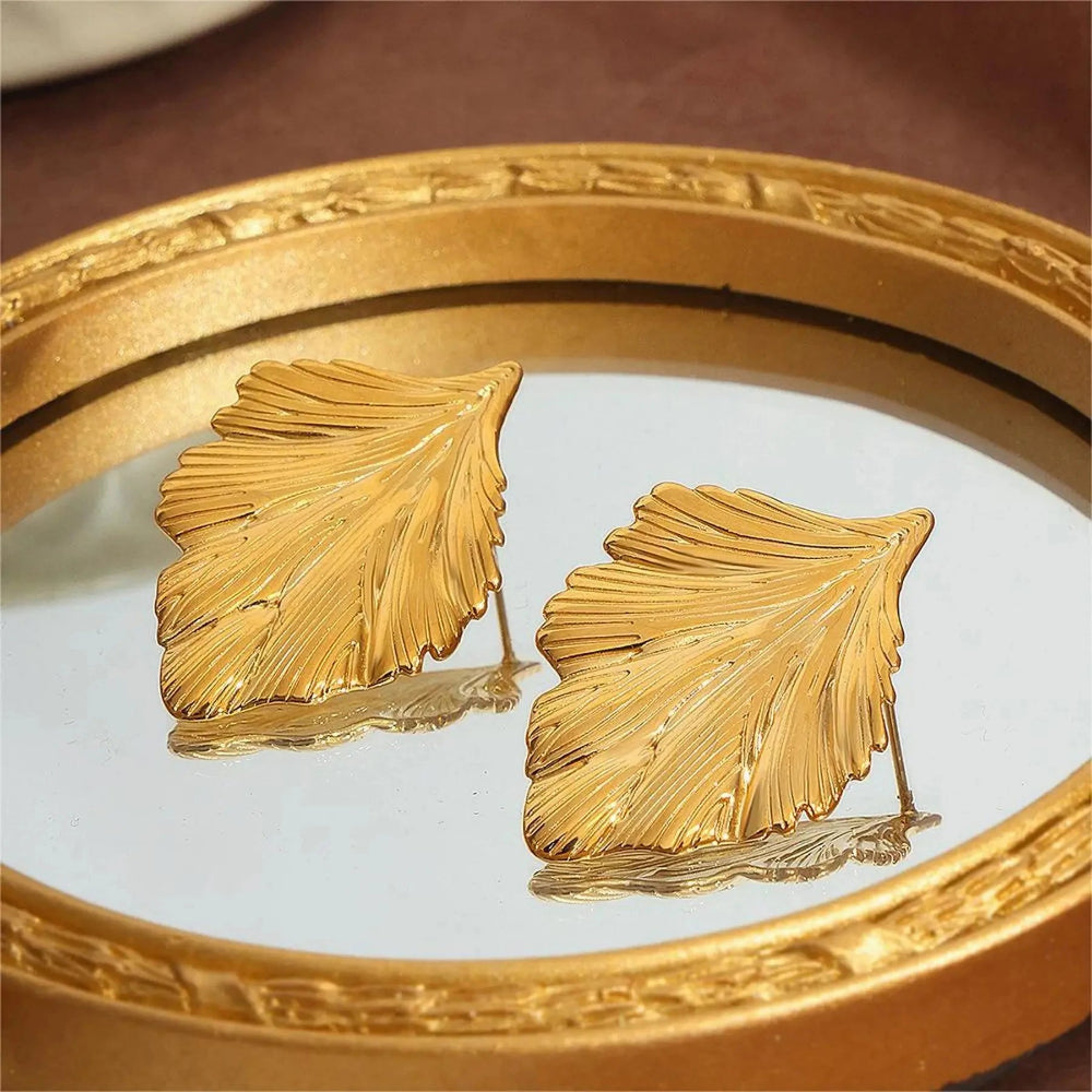 Naisten roikkuvat korvakorut lehdet kulta