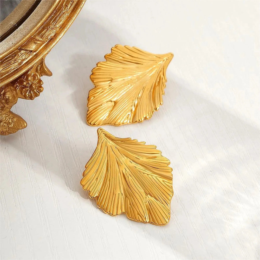 Naisten roikkuvat korvakorut lehdet kulta