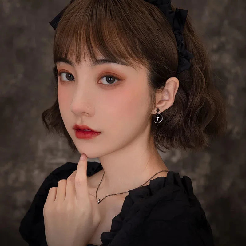 Riipuvat korvakorut kuu ja tähdet