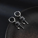 Riipuskorvakorut, buddhalainen rukouspyörä