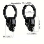 Miesten roikkuvat korvakorut, joissa pääkallo