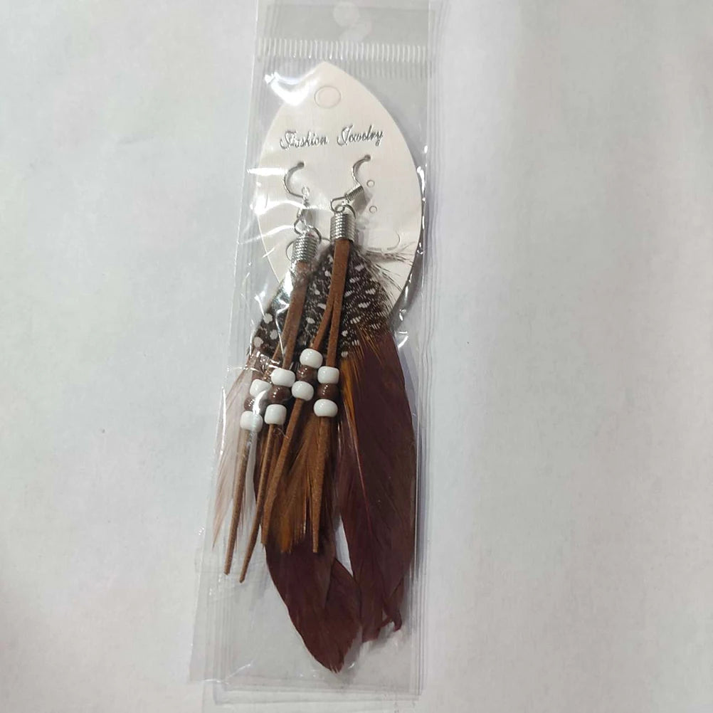 Apachityyliset ruskeat sulkakorvakorut 
