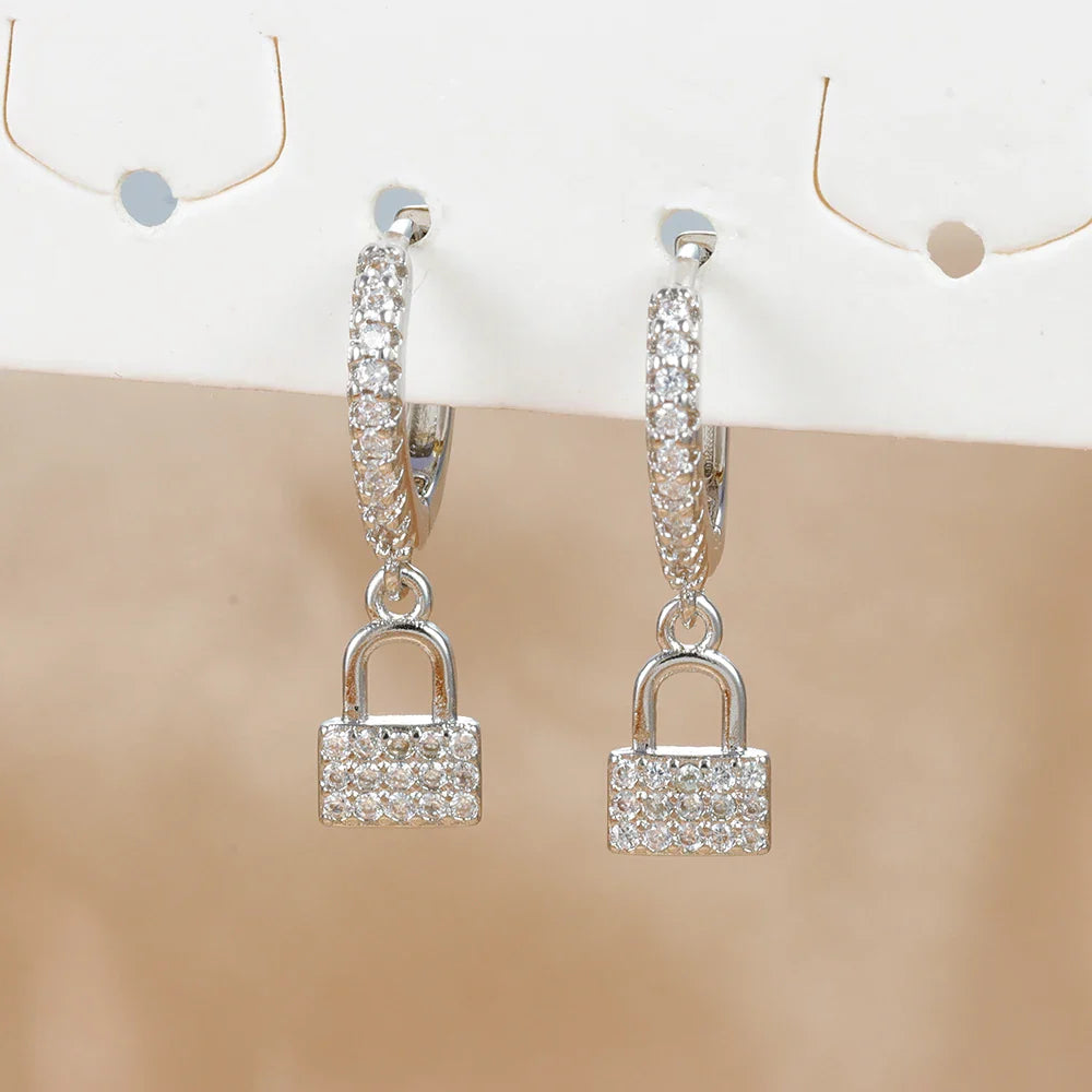 Vannekorvakorut avain ja lukko strassikivillä hopea