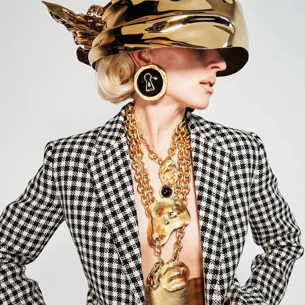 Pyöreät korvakorut avain musta